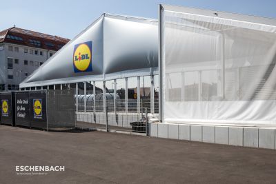 Lidl sales tent with thermal covering, glass elements and sandwich facade