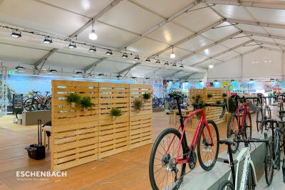 Trade fair tent for a bicycle trade fair with fixed fair cladding covering